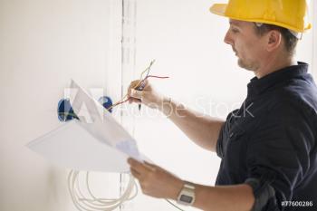 Construction worker doing wiring